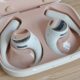 Honor earbuds in case with Editors Choice badge.